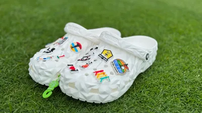 We combined with other golf themed charms to decorate our own charm